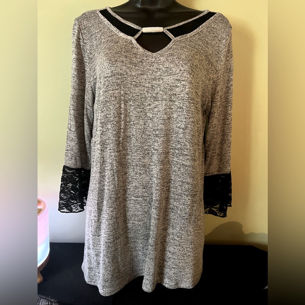 Elegant but comfortable top. Office casual to evening out favorite.